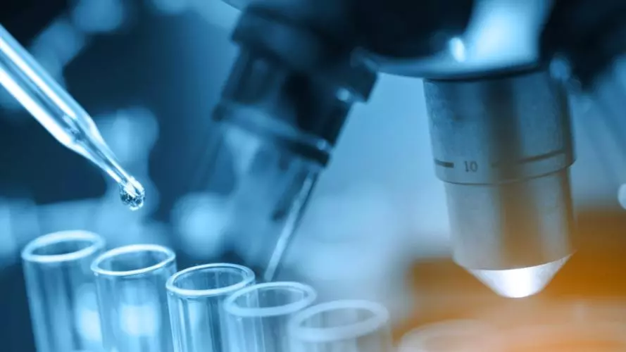 lab microscope and test tubes