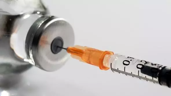 Vaccine being drawn