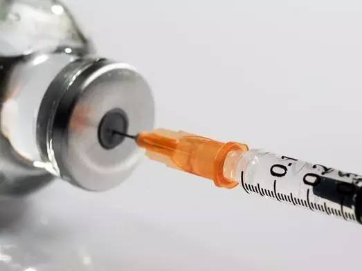 Vaccine being drawn