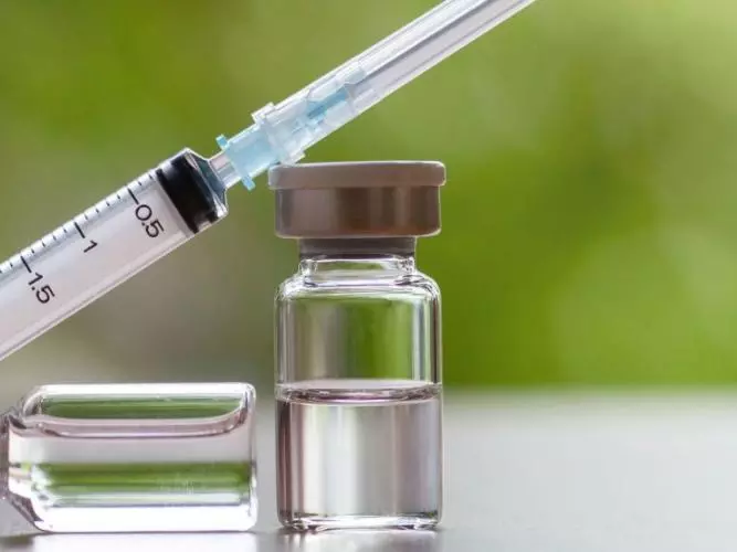 Vaccine Vial and Syringe