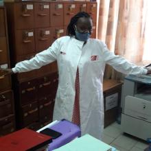 happy researcher in labcoat